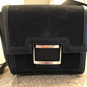 Black satchel with adjustable strap